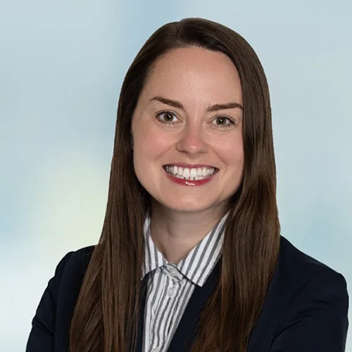 A photo of attorney Haley Miller against a softly blurred office background.
