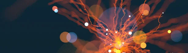 Abstract image of bright orange electrical sparks radiating outward against a dark background, with soft, out-of-focus light circles creating a dynamic and energetic effect.