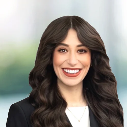 A photo of attorney Ashley Lopeztello against a softly blurred office background