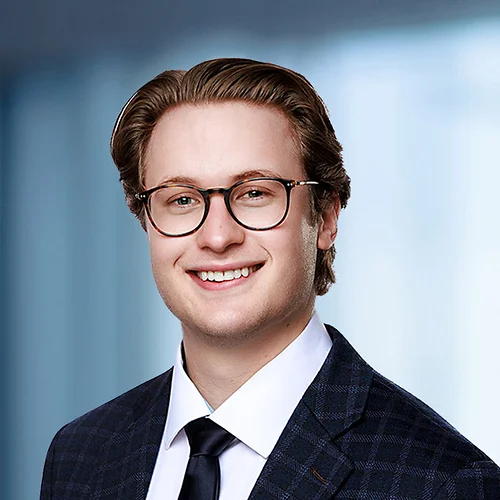 A photo of attorney Nathan Stone against a softly blurred office background