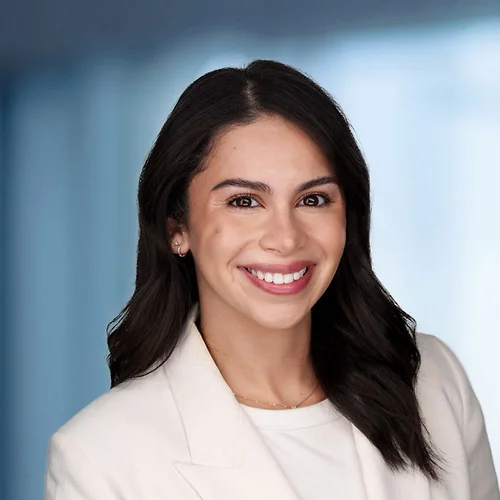 A photo of attorney Shaida Shahinfar against a softly blurred office background