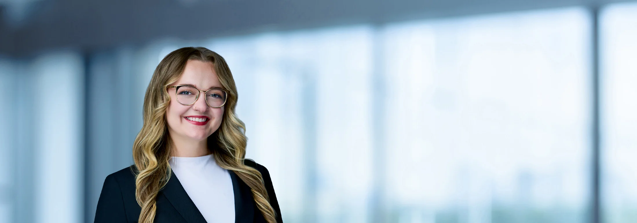 A photo of attorney Karlee Gordon against a softly blurred office background