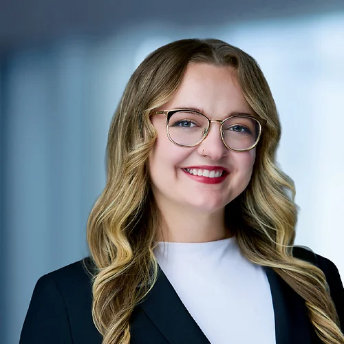 A photo of attorney Karlee Gordon against a softly blurred office background