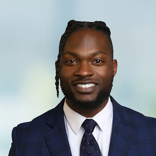 A photo of attorney Bryant Andrews against a softly blurred office background