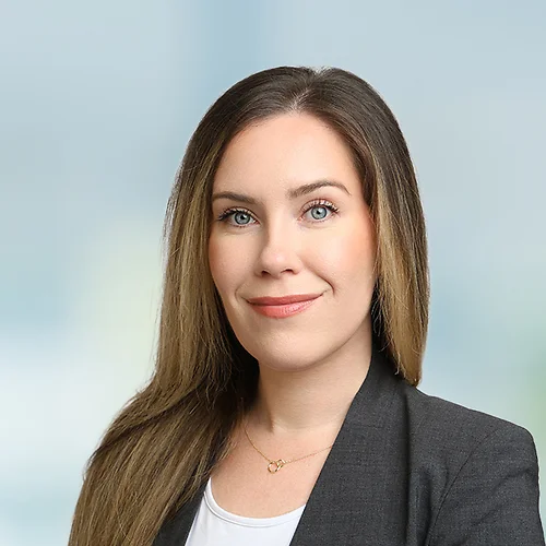 A photo of attorney Alecsandria Cook against a softly blurred office background