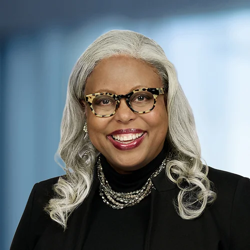 A photo of attorney Michon Crawford against a softly blurred office background