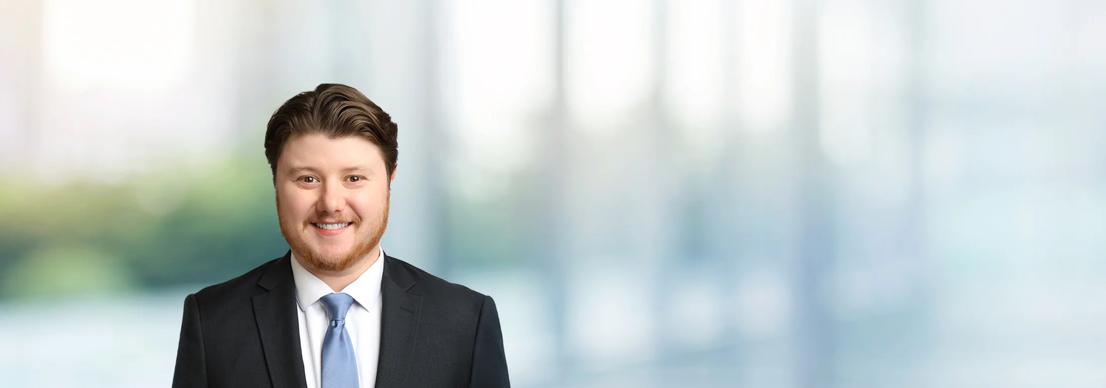 A photo of attorney Brendan Sullivan against a softly blurred office background