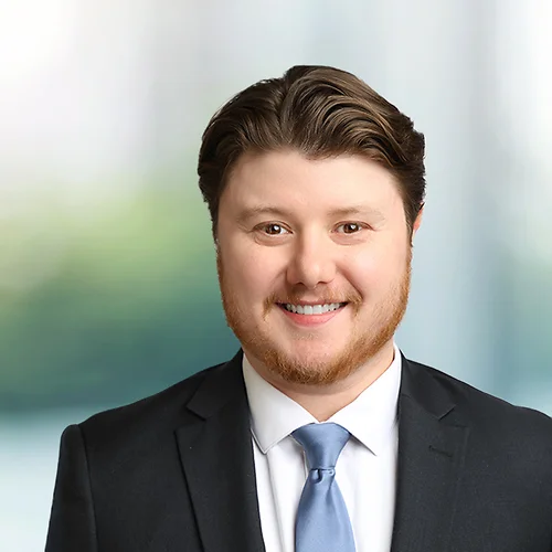 A photo of attorney Brendan Sullivan against a softly blurred office background