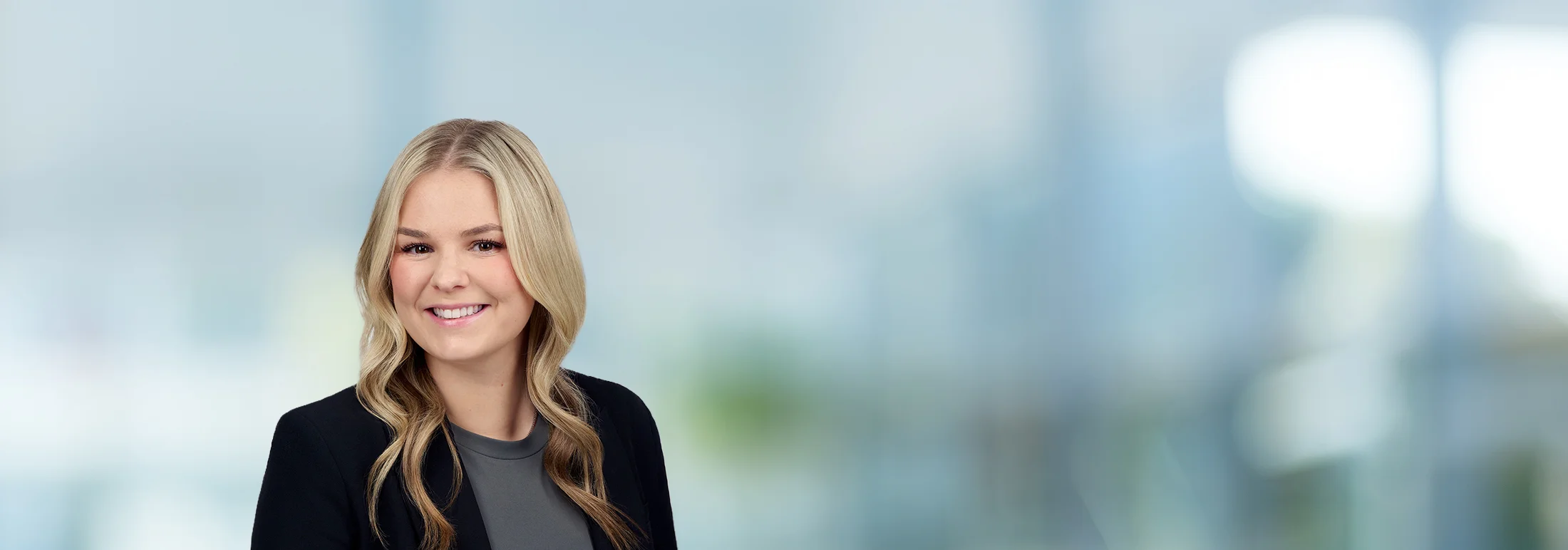 A photo of attorney Stephanie White against a softly blurred office background
