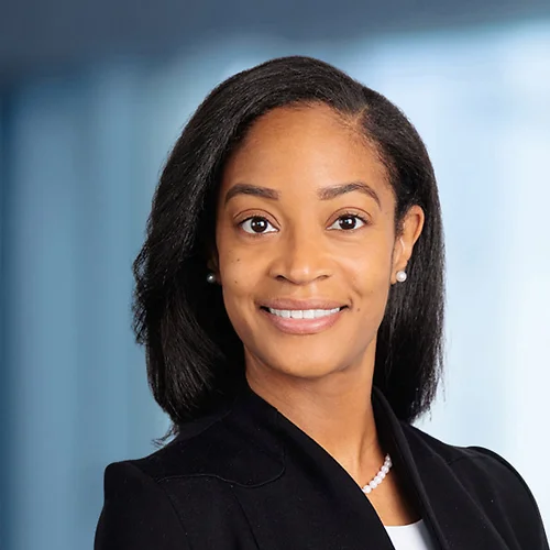 A photo of attorney Tanganica Turner against a softly blurred office background