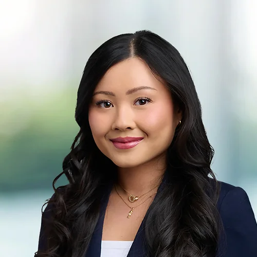A photo of attorney Tiffany Nguyen against a softly blurred office background