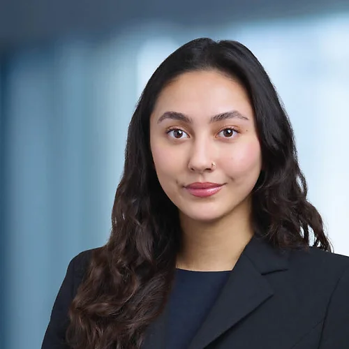 A photo of attorney Kiersten Yamamoro against a softly blurred office background