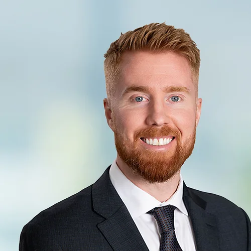 A photo of attorney Russell Kalvelage against a softly blurred office background