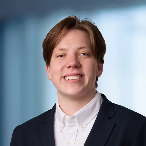 A photo of attorney Shannon Reny against a softly blurred office background