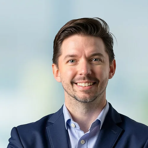 A photo of attorney Johnny Antwiler against a softly blurred office background