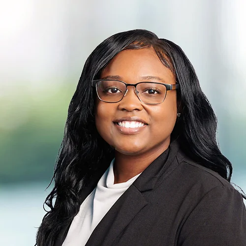 A photo of attorney Tiara Porterfield against a softly blurred office background