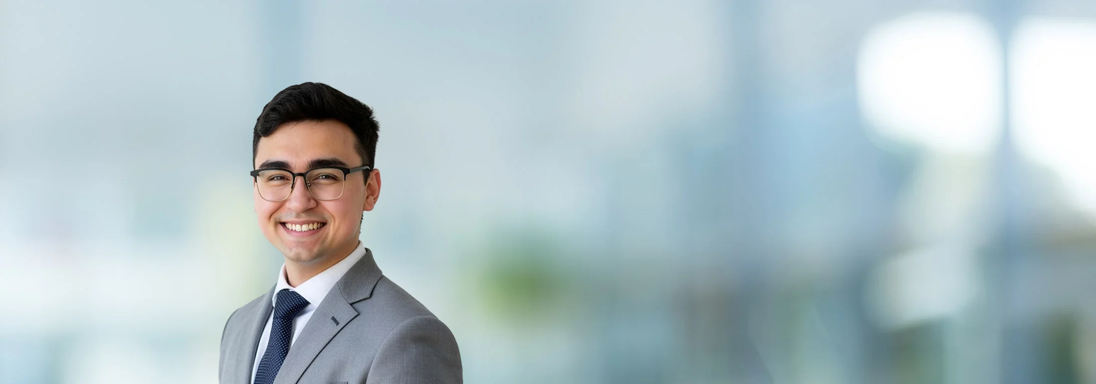 A photo of attorney Cameron Vahlkamp against a softly blurred office background