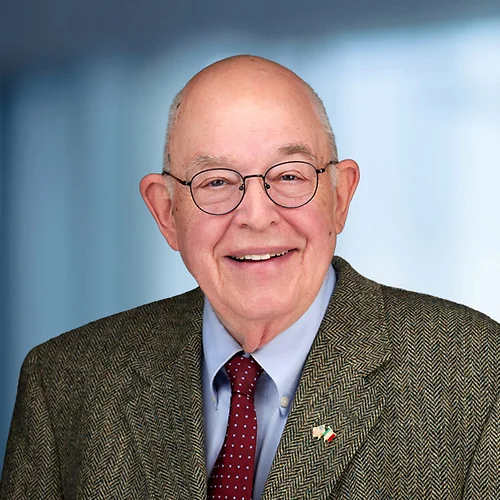 A photo of attorney John Purdy against a softly blurred office background