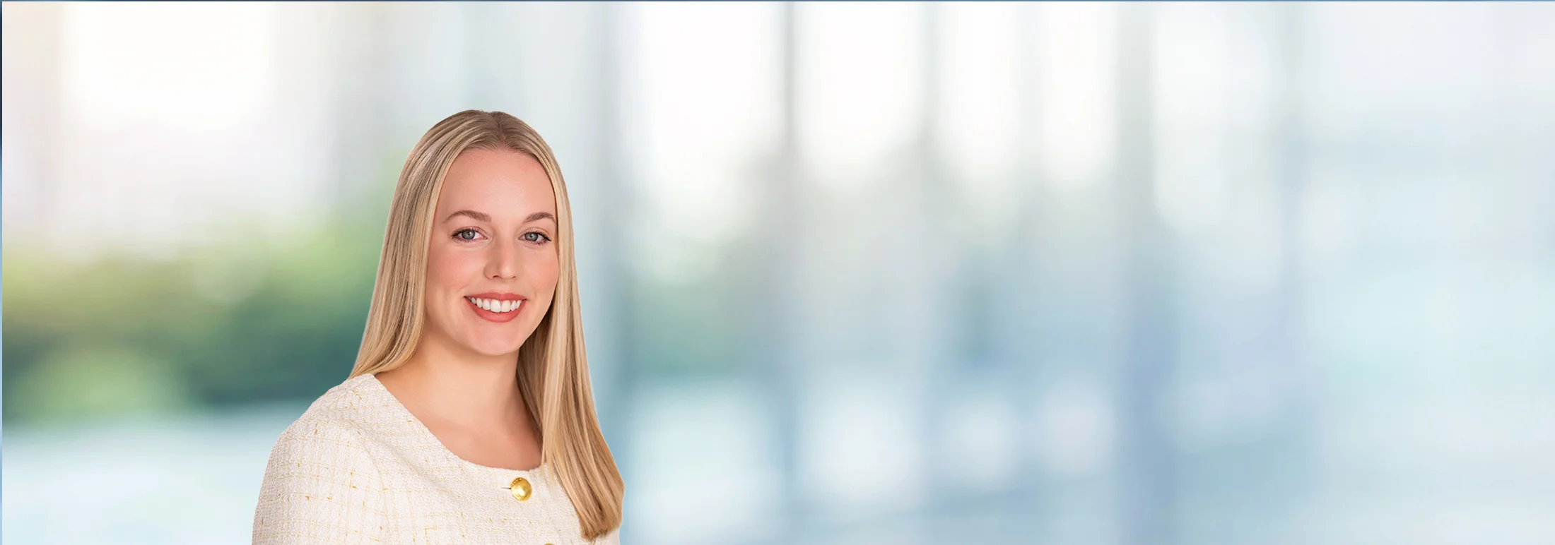 A photo of attorney Danielle Blanchette against a softly blurred office background