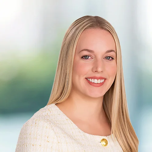 A photo of attorney Danielle Blanchette against a softly blurred office background