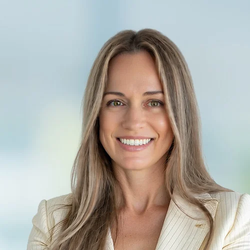 A photo of attorney Margot Parker against a softly blurred office background
