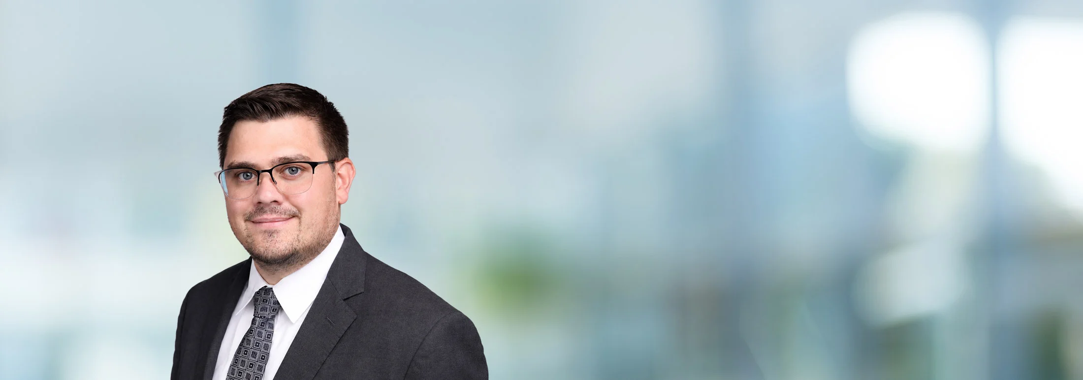 A photo of attorney Art Murphy against a softly blurred office background